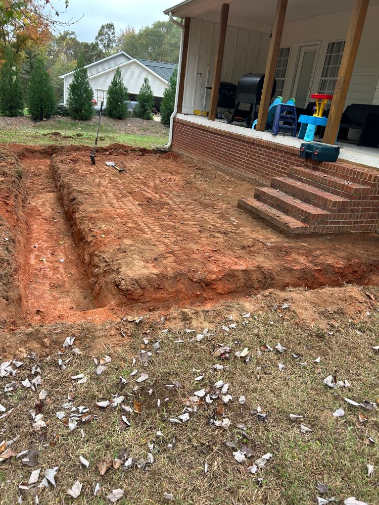 Our French & Gutter Drains service effectively manages water runoff, preventing property damage by expertly installing drainage systems that redirect excess water away from your home's foundation and landscape. for JHC Excavation LLC in Hartwell, GA