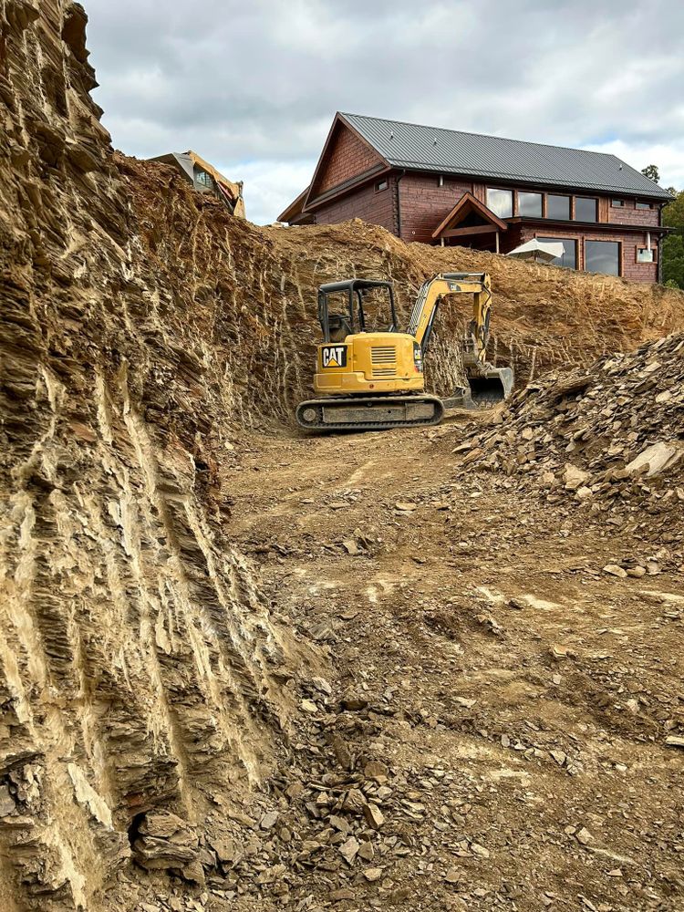 Our Residential & Commercial Excavation service provides precise site preparation, ensuring a strong foundation and seamless integration with your pool construction project, enhancing durability and elevating your outdoor space's aesthetic appeal. for Grasshopper Excavating & Pools in Pigeon Forge, TN