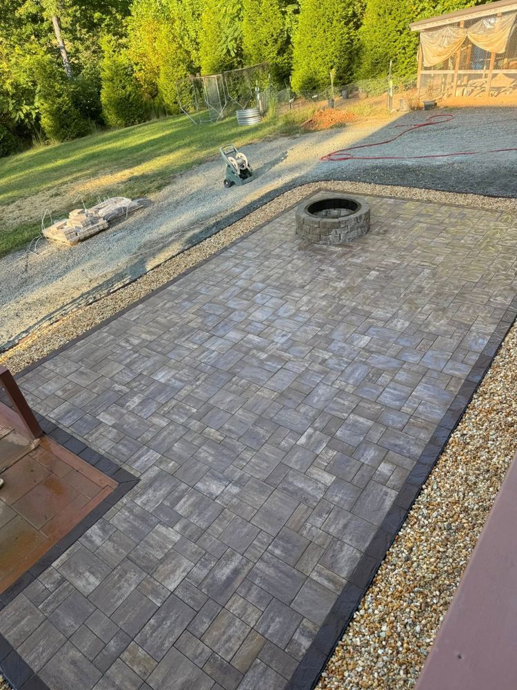 Transform your outdoor space with our Patio Design & Construction service, creating a beautiful and functional area that enhances your home's aesthetic and elevates your outdoor living experience. for Chiles Lawn & Landscaping in Gordonsville, VA