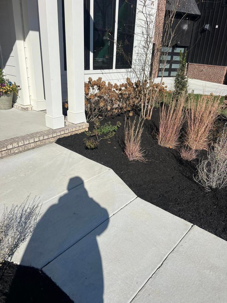 Our Mulch Installation service includes selecting the best type of mulch for your landscaping needs, delivering and spreading it evenly throughout your yard to improve soil health and enhance curb appeal. for Team Bard Lawn Care SVC in Woodbury, TN