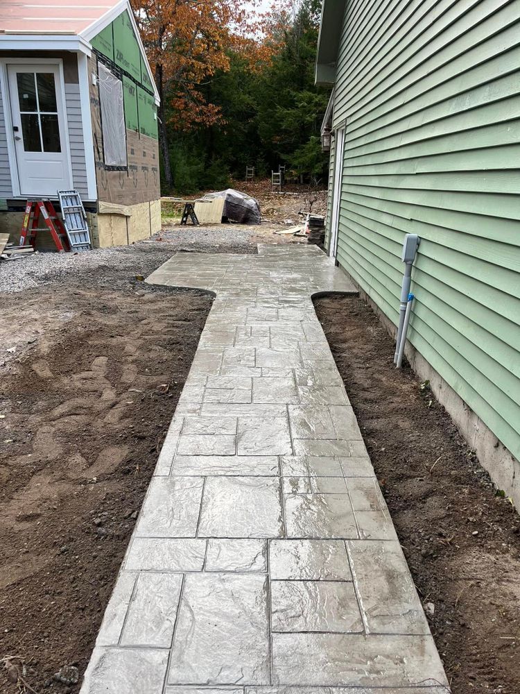 Our Foundation Walls service ensures the foundations of your home are strong and durable, offering expert solutions for new constructions or repairs to enhance structural integrity and longevity. for Custom Concrete of Maine in Biddeford, ME
