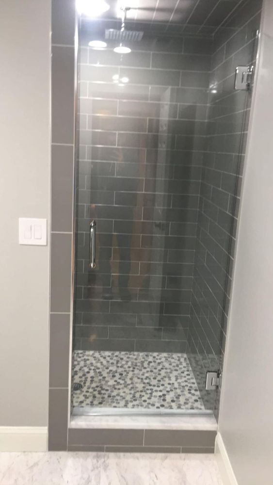Transform your outdated bathroom into a modern oasis with our expert renovation service. From new fixtures to beautiful tile work, we'll help create the perfect space for relaxation and rejuvenation. for Measured Excellence LLC in Commerce, GA