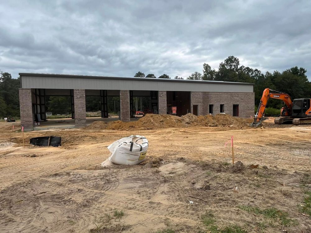 Our Excavation service ensures precise groundwork preparation to create a solid foundation for your project, enhancing safety and efficiency while minimizing disruption to your home's surrounding areas during construction or remodeling tasks. for J.M. Midlo Construction in Waynesboro, GA