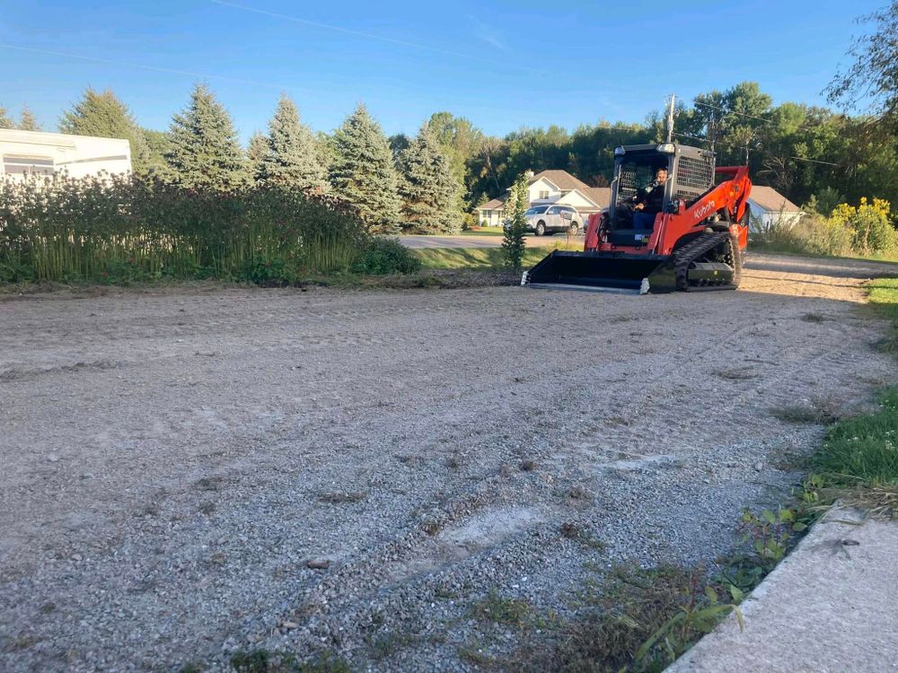 Transform your outdoor space with our land grading service, ensuring proper water drainage and a level foundation for landscaping projects, enhancing the beauty and longevity of your yard. for Wilcox Landworks in Pulaski, WI