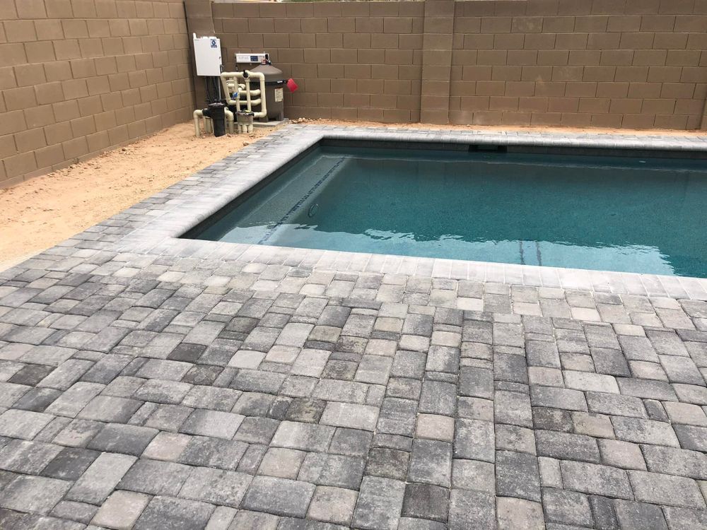 Our Patio Design & Construction service offers homeowners the opportunity to create a beautiful and functional outdoor living space, tailored to their style and needs for relaxing, entertaining, and enjoying nature. for Desert Oasis Hardscape LLC  in Scottsdale, Arizona