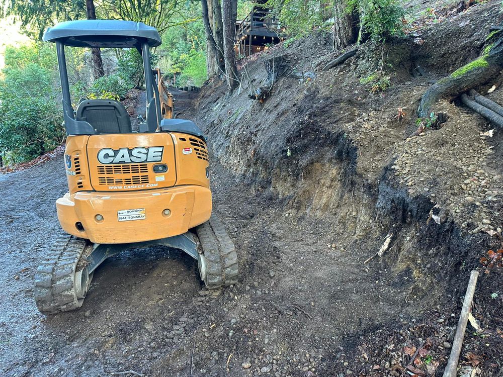 Our excavation service includes efficient and reliable digging, trenching, grading, and land clearing to transform your outdoor space. Let us help you with all your landscaping projects today. for Unique Landscaping in Poulsbo, WA