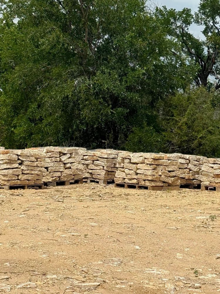 Our Retaining Wall Construction service provides durable and aesthetically pleasing walls, expertly crafted to enhance stability and beauty in your landscape, while ensuring long-lasting protection against soil erosion. for Hernandez Masonry & Concrete LLC in Granbury, TX