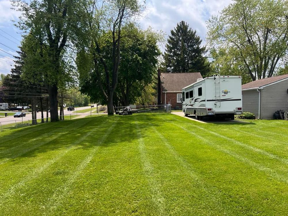 Our professional mowing service ensures a pristine lawn with precise cuts, tailored scheduling, and attention to detail, enhancing the beauty and health of your outdoor space while saving you time. for Steed's Lawn and Landscape LLC in White Lake, MI