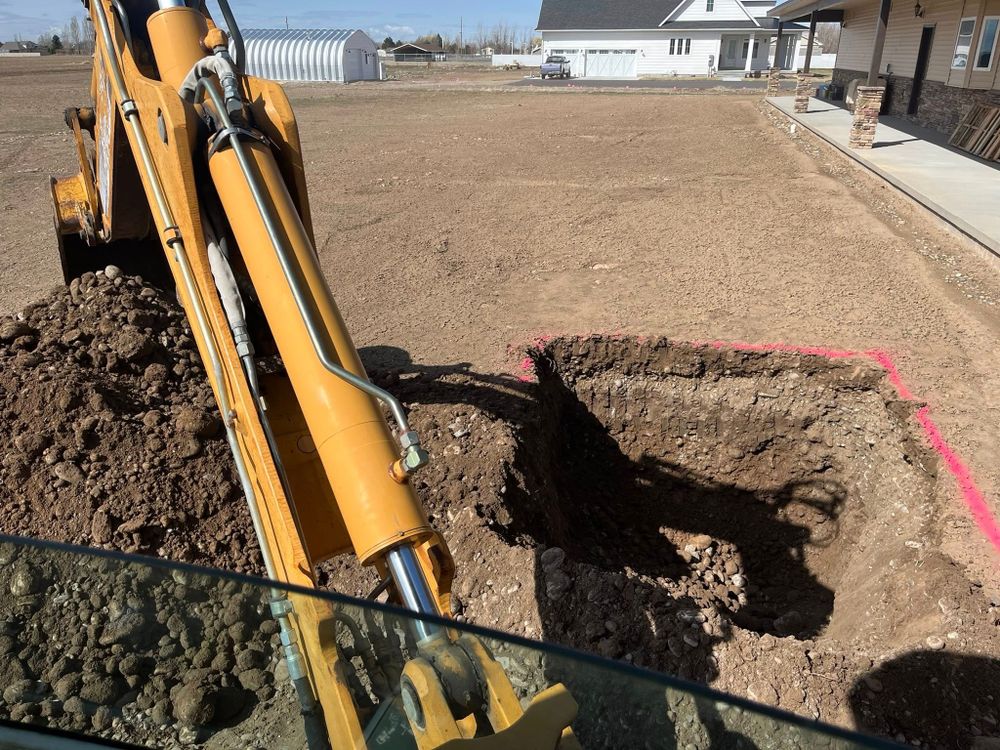 Our Land Grading service ensures your property is level and ready for construction or landscaping, providing a stable foundation while effectively managing drainage and preventing erosion. Enhance your home's safety and appearance today. for SilverStone Excavation in Rigby, ID
