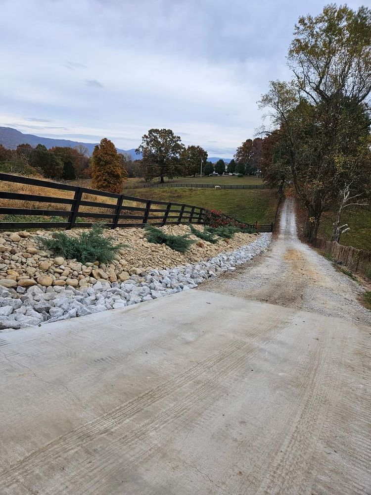 Enhance your outdoor space with our expert landscape installation services. We specialize in transforming yards through professional mulch installation that adds beauty and supports plant health in your garden. for Lafollette Mulch, Stone and Lawn Care in La Follette, TN