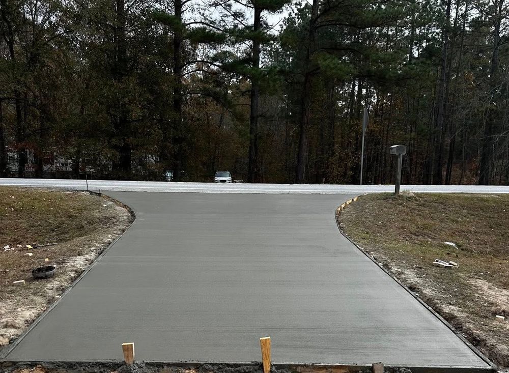 Our Hardscape Design & Construction service creates beautiful, durable outdoor features like patios, walkways, retaining walls, and fire pits that enhance your property’s function, value, and year-round enjoyment. for V&S Grading in Harlem, GA