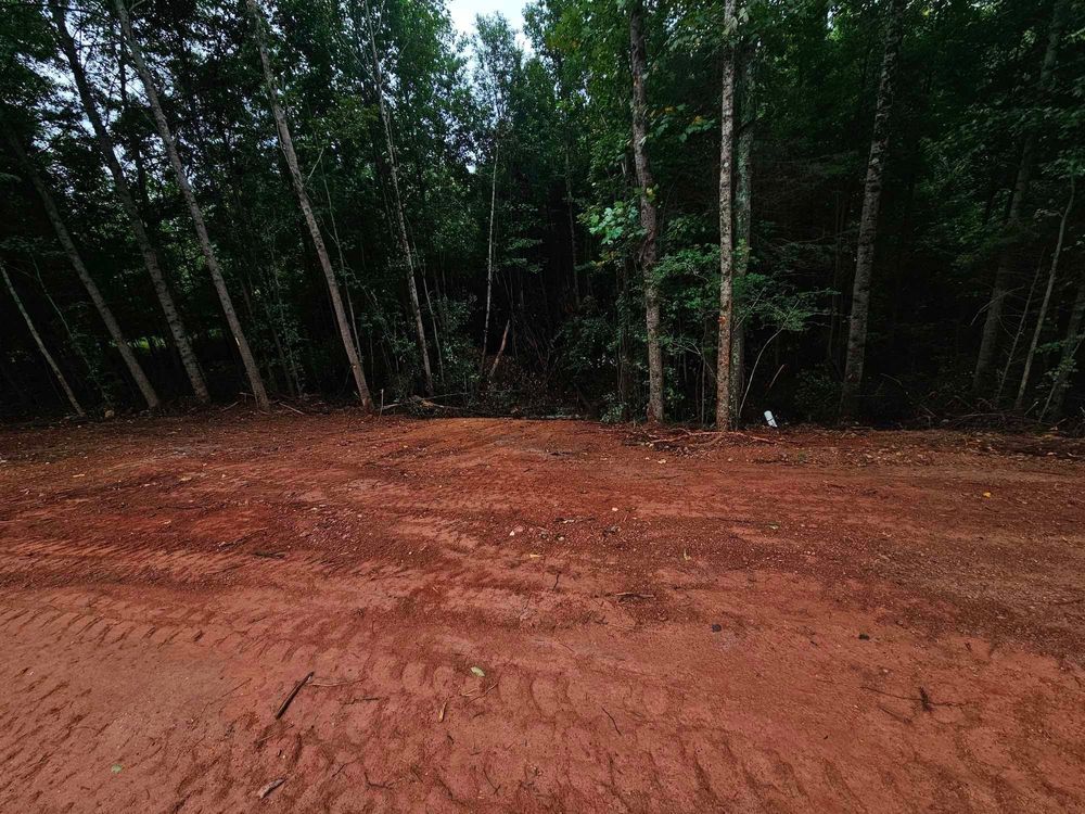 Our Land Grading service ensures a smooth, level surface for your property, improving drainage and foundation support. Trust our skilled team to prepare your land for landscaping or construction projects with precision. for Jason Scott Grading & Clearing in Williamson, GA