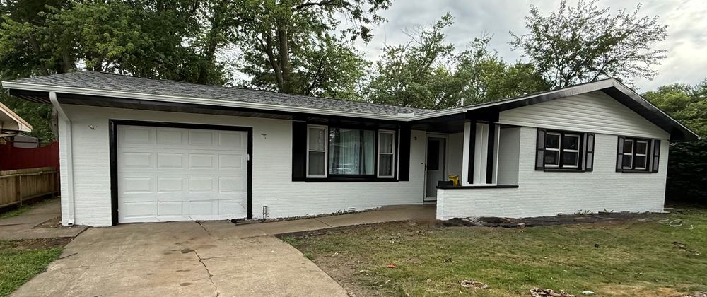 Enhance your home's curb appeal with our expert painting services, offering precision and quality to ensure a flawless finish on fences, exteriors, or interiors. Trust us for vibrant and lasting results. for Zenn Exteriors in Champaign, IL