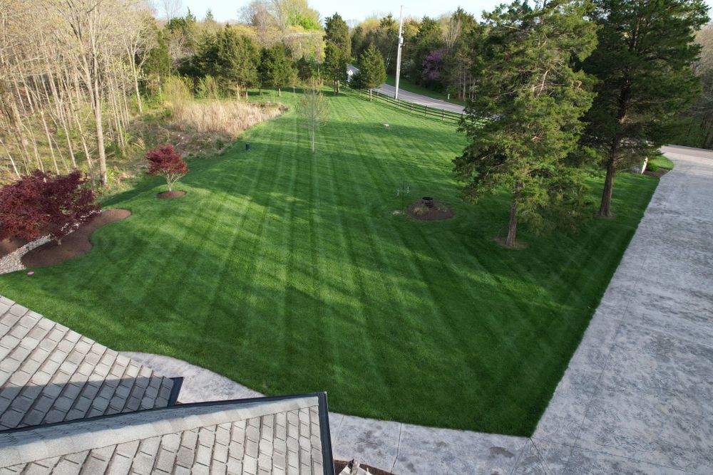 Our professional mowing service ensures your lawn stays healthy, green, and expertly maintained. Let us take care of the hard work so you can relax in a beautiful outdoor space. for Trust Lawn and Landscape  in Pacific, MO