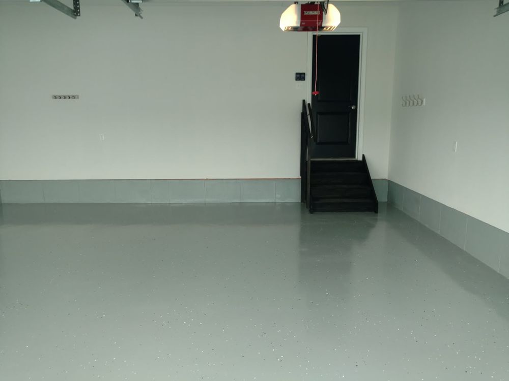 Our Epoxy Flooring Installation service transforms garages, basements, and workshops with durable, seamless, stain-resistant surfaces that look great, withstand heavy use, and provide long-lasting protection for your home. for Mccormick Painters in Monroe County, NY