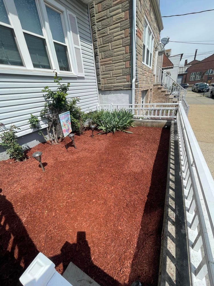 Enhance the aesthetic appeal and health of your garden with our professional mulch installation service. We use high-quality materials to control weeds, retain moisture, and improve soil fertility for a vibrant landscape. for Next Level Landscaping & Construction in Bayonne, NJ