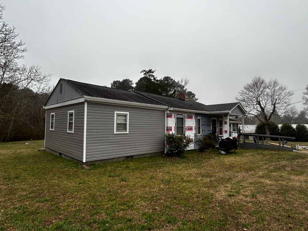 Enhance your home's exterior with our professional vinyl siding services, offering durability and low maintenance while boosting curb appeal and energy efficiency in perfect harmony with our expert roofing solutions. for Crown Roofing & Remodeling in Wake Forest, NC