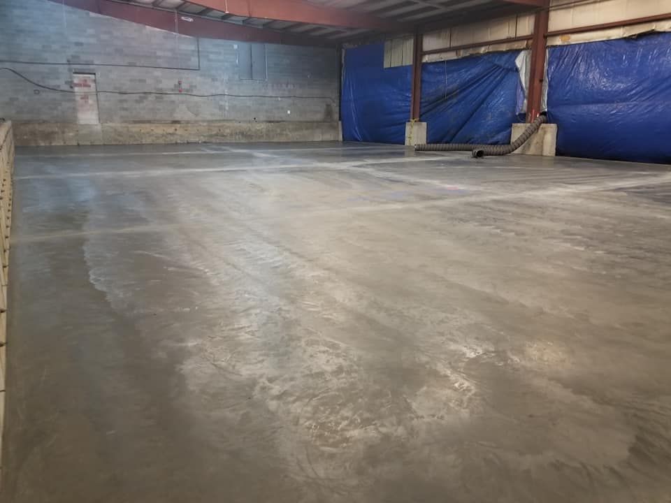 Explore our top-notch Commercial & Residential Floors service, expertly designed to complement your space. Enjoy enhanced safety and visibility with our integrated commercial parking lot lights for a seamless experience. for Stallion Concrete Inc in Berkley, MA