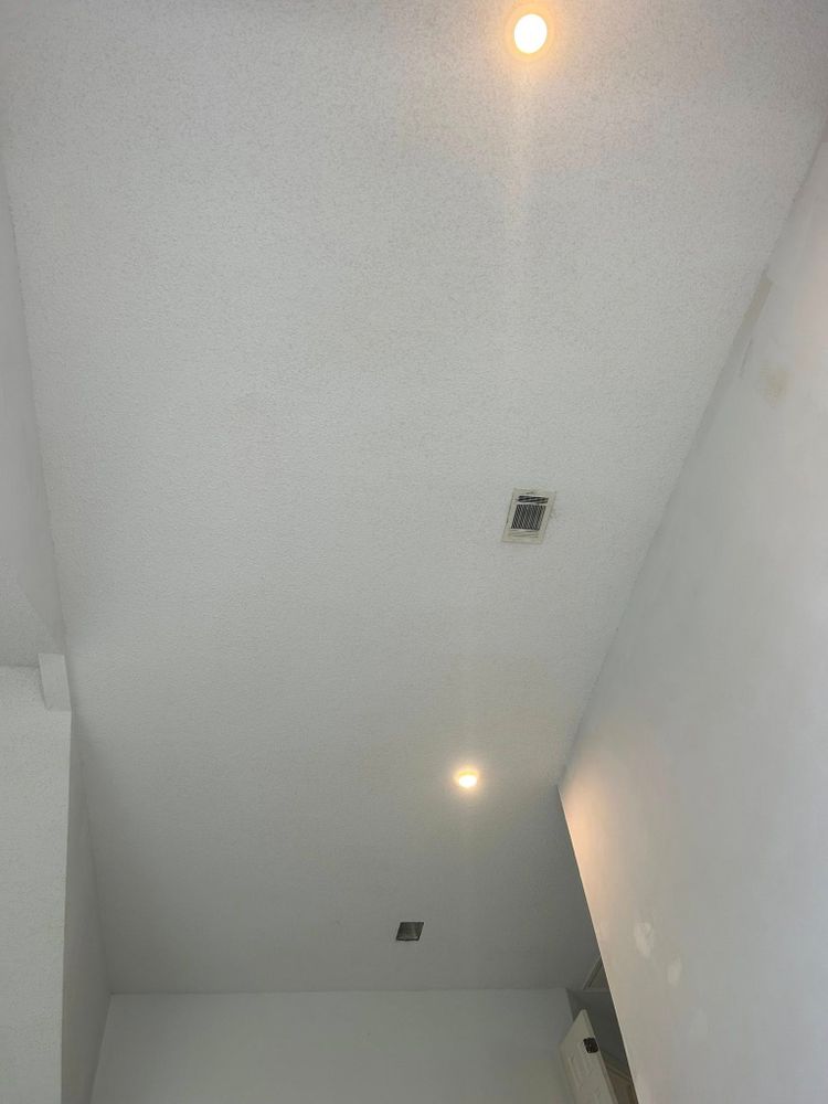 Our Popcorn Ceiling Removal service safely eliminates outdated textured ceilings, creating a smooth, modern finish ready for paint. We minimize dust, protect your home, and deliver clean professional results. for HD Property Services in Wilmington, NC