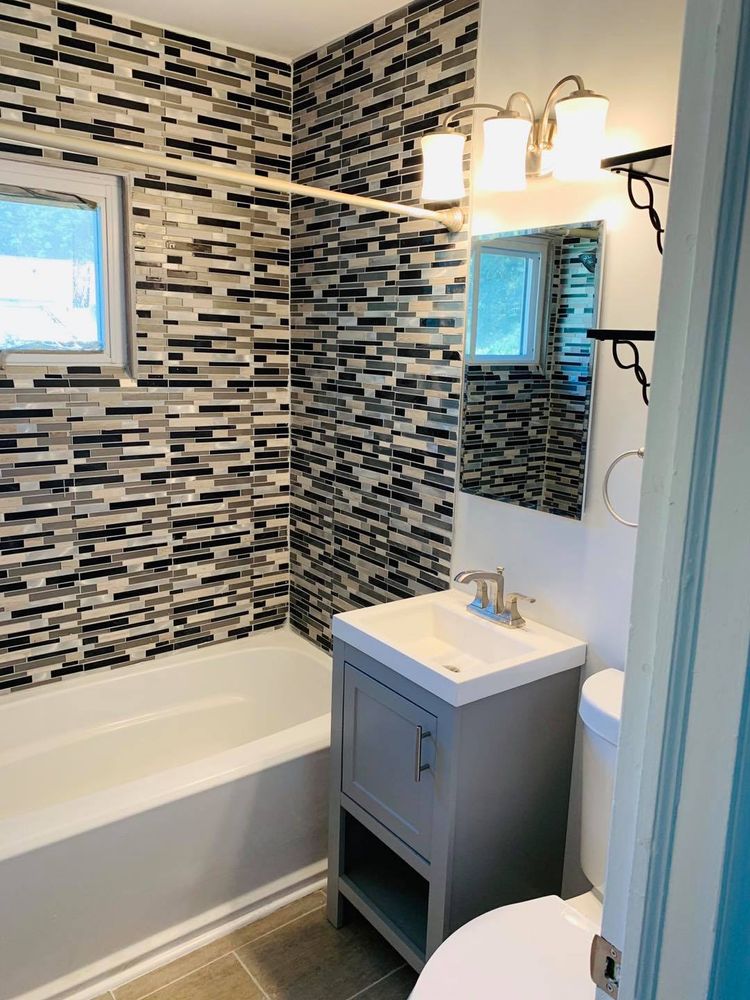 Our Bathroom Renovation service can completely renovate your bathroom, from the flooring to the ceiling. We can also update your bathroom fixtures and add new features, such as a spa tub or steam shower. for St. Joseph Carpentry & Remodeling in , 