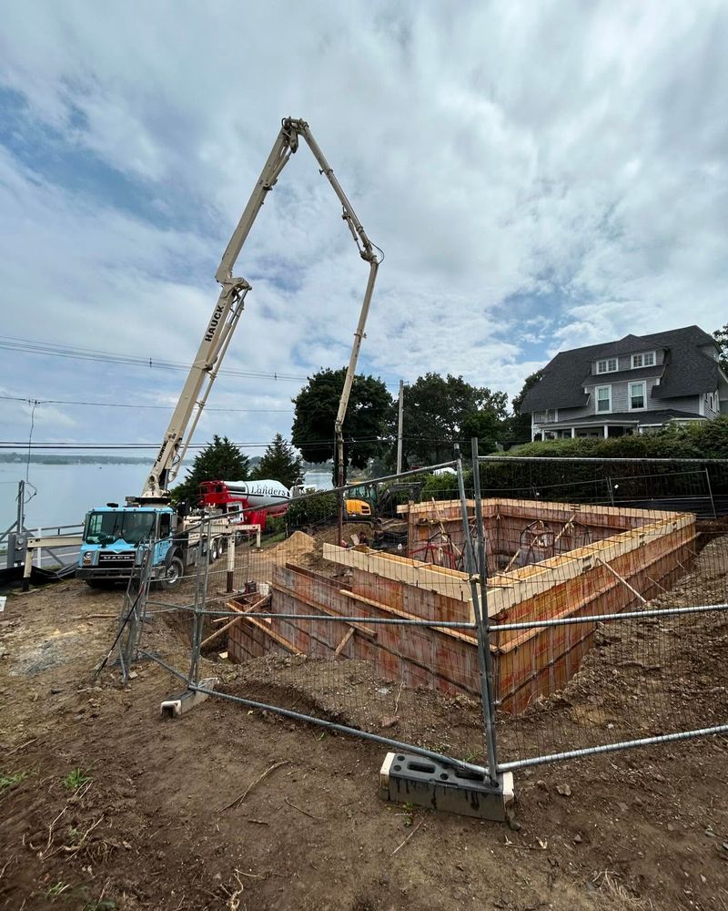 Our hardscaping service designs and installs patios, walkways, retaining walls, driveways, and outdoor features that enhance beauty, improve function, increase property value, and create durable spaces for everyday living. for Melia Construction in Hingham, MA