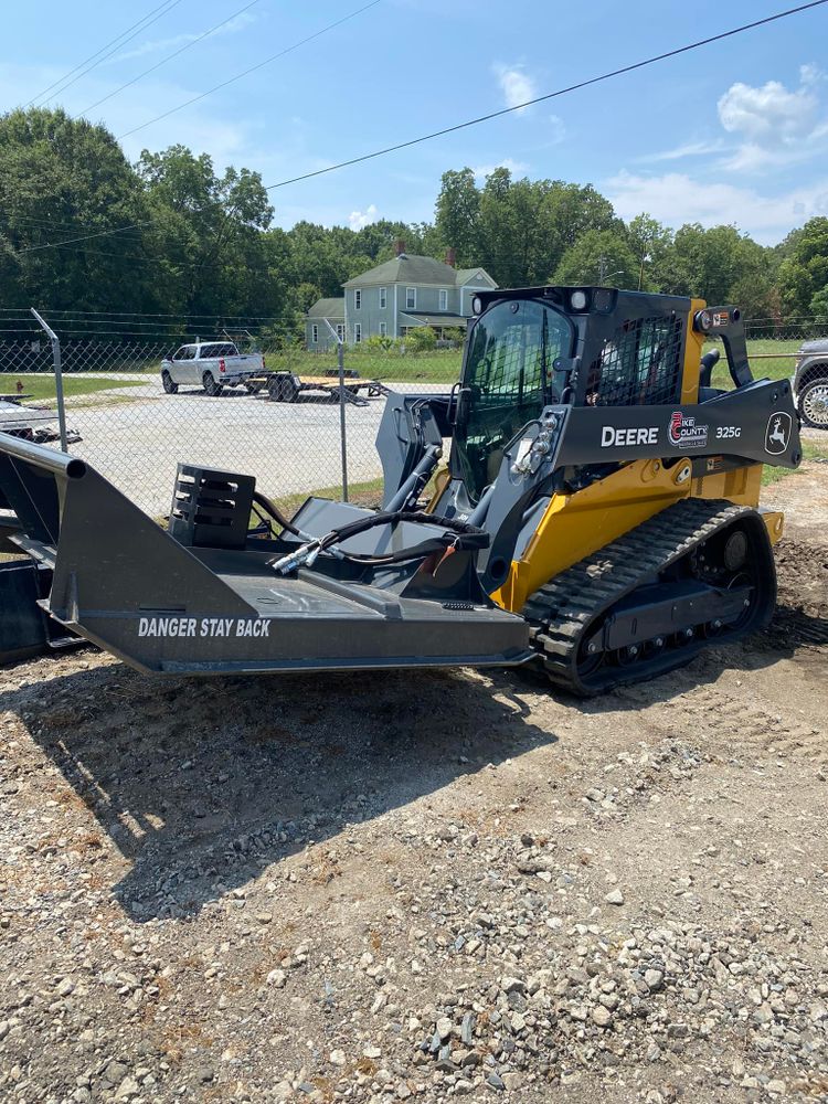 Our grading service ensures precise land leveling and preparation for construction projects, enhancing the efficiency and durability of your property. Trust us to deliver superior results with our expert equipment and skilled operators. for Pike County Rentals & Sales in Concord, GA