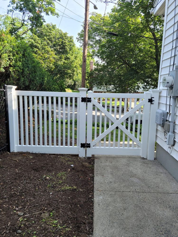 Gate Arbor is an auxiliary service offered by our fencing installation company that provides elegant, durable and customizable gate structures to enhance the beauty and functionality of your fence. for Azorean Fence in Peabody, MA