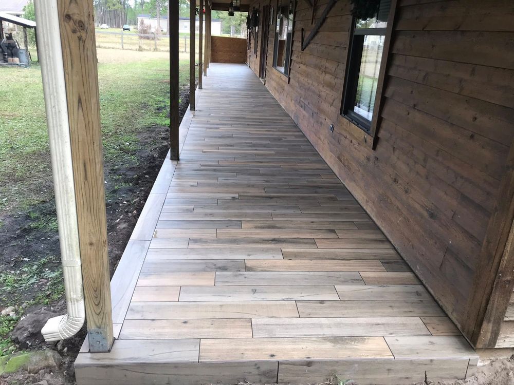 Transform your outdoor space with our expert Deck & Patio Installation service, offering personalized designs and quality craftsmanship to create the perfect area for relaxation and entertaining guests. for Strictly Custom Tile Inc. in Middleburg, FL