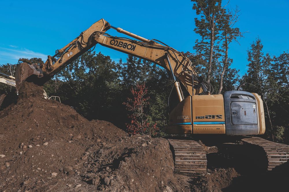 Carving a Pond into a Mountain Side for Andy Naylor Excavation in Johnson, VT