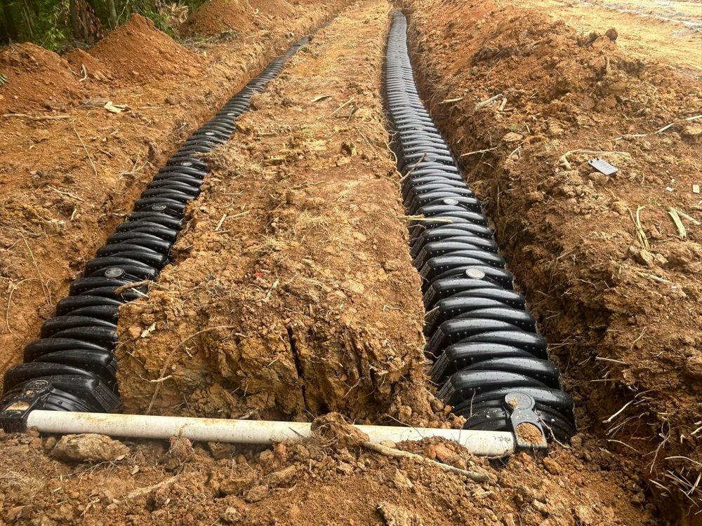 Our expert Drainage System Install & Repair service ensures efficient water flow, preventing property damage. Trust our skilled team for reliable solutions to protect your home with seamless installation and maintenance. for Moose Excavating in Athens, TN
