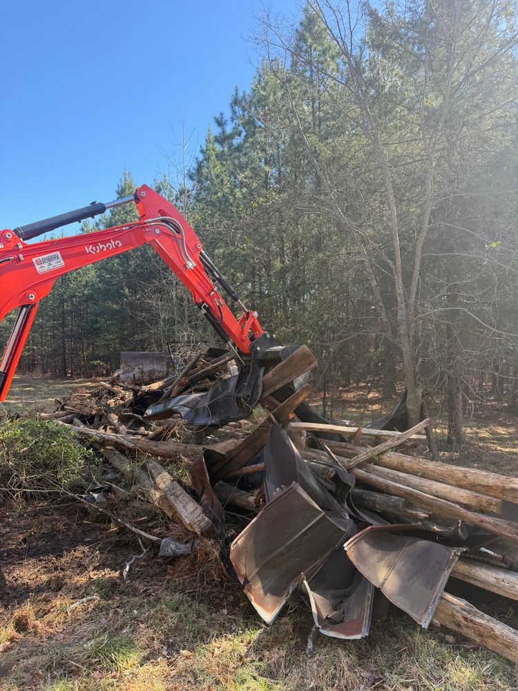 Our demolition services near me safely remove old structures, debris, and obstacles to prepare your property for clearing, grading, or new construction with efficient work, careful planning, and dependable results. for Hunt’s Hauling & Landworks LLC in Danville, VA