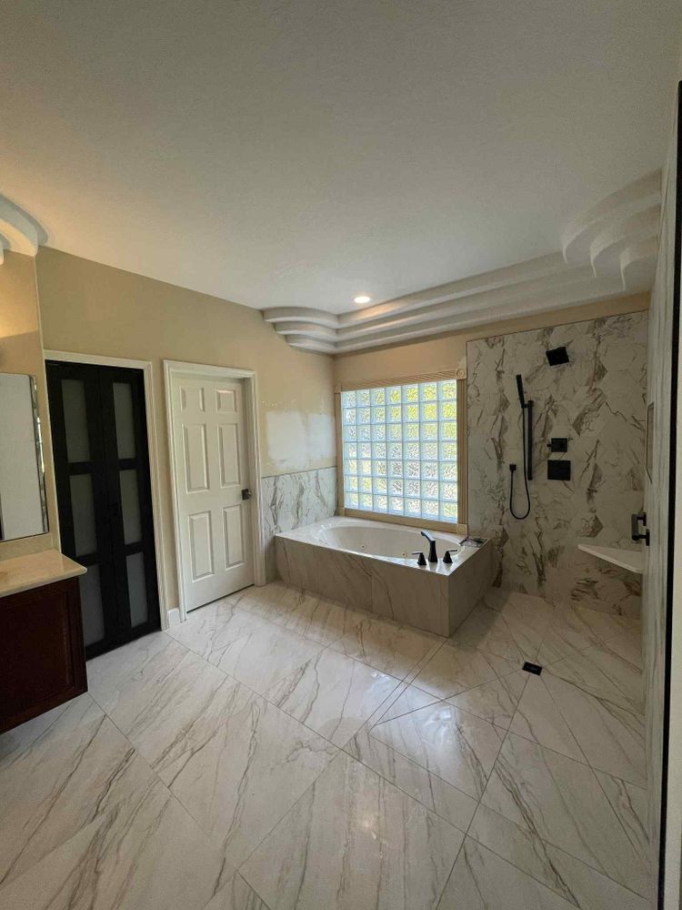 Transform your bathroom with our expert renovation services. We offer professional tile installation, high-quality materials, and customized designs to enhance your space's functionality and aesthetic appeal. Trust us for exceptional results. for Mike Lupoli Tile in Palm Coast, FL