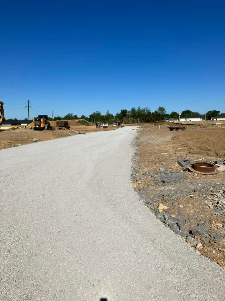 Our Roadbeds service ensures a strong foundation for your property by expertly preparing the ground for construction, providing stability and durability to any structure you plan to build. for Ledbetter Excavation in Shelbyville, TN