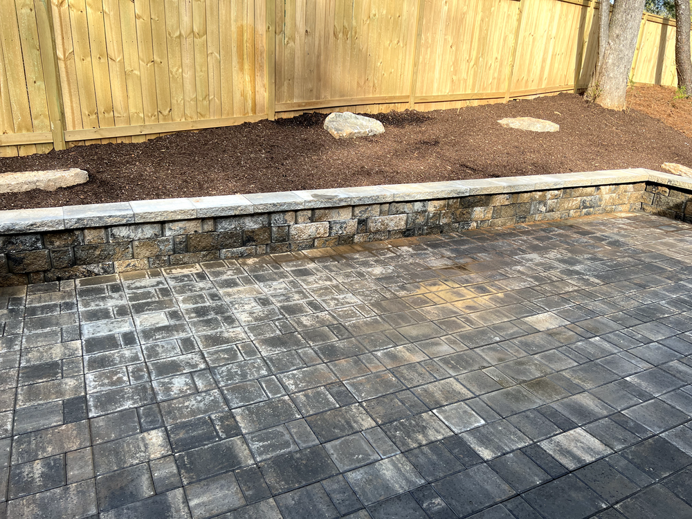 Our Retaining Wall Construction service enhances your outdoor spaces with durable, aesthetically pleasing walls designed to prevent soil erosion while adding structure and beauty to your landscape. for Rescue Construction LLC in Marietta, SC