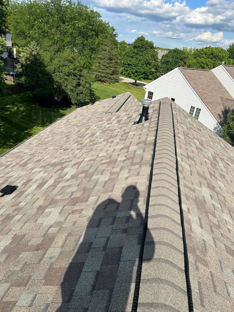 Our Asphalt Shingles service offers homeowners a durable and cost-effective roofing solution that provides protection from the elements while enhancing the aesthetic appeal of their home's exterior. for Rucker Roofing, LLC in Dayton, OH