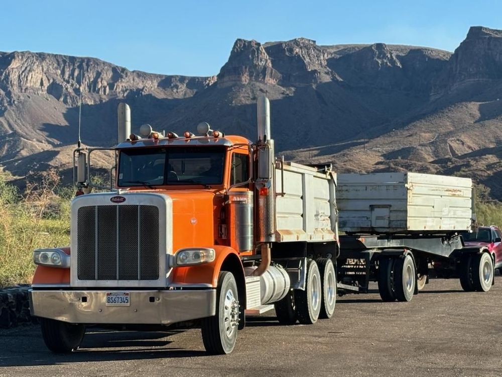 Our Rock Transportation service efficiently delivers high-quality rock materials directly to your site, ensuring timely and reliable support for your construction or landscaping projects with the utmost professionalism and care. for Rocky Pine Dirt & Aggregate in Kingman, AZ