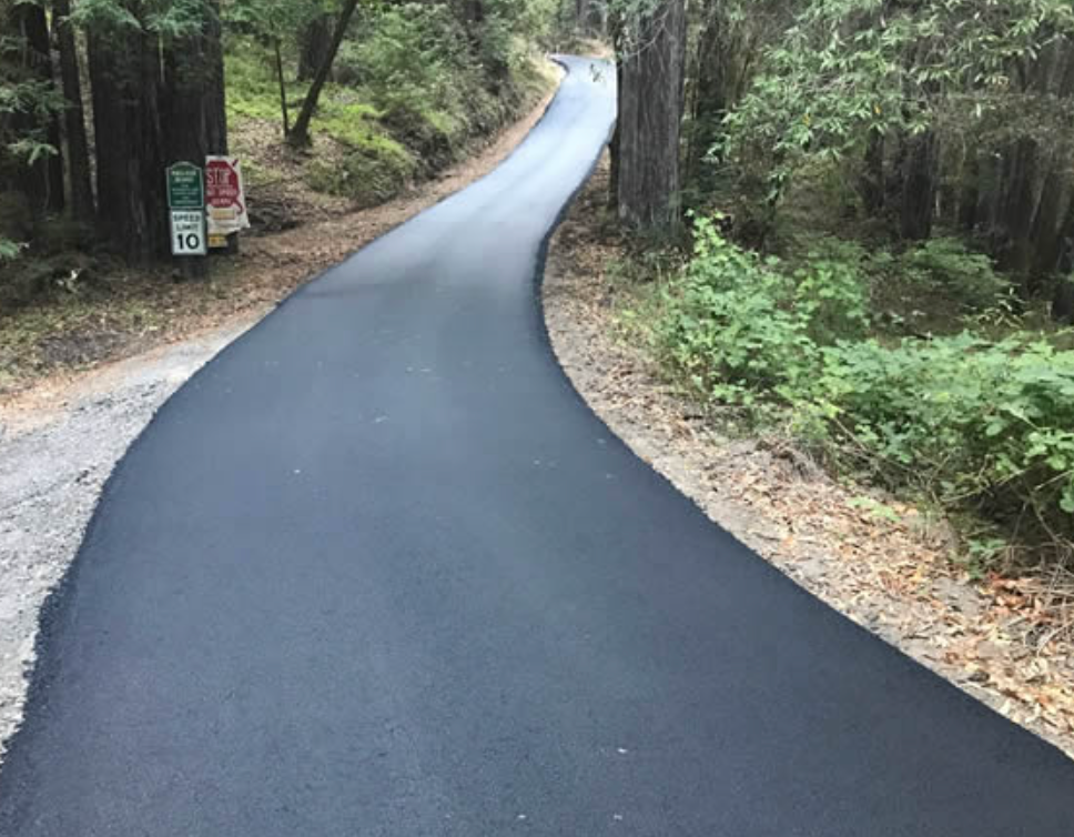Enhance your driveway's durability and appearance with our Asphalt Seal Coating service, offering long-lasting protection against weather damage, cracks, and wear while improving curb appeal for a pristine home exterior. for The Lot Doctor in Seminole County, OK