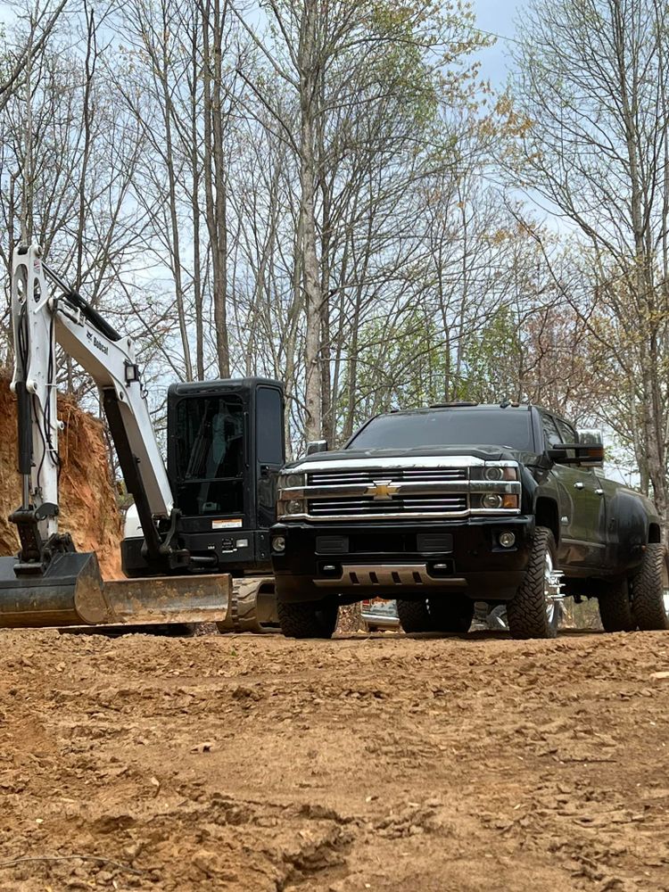 Our Residential & Commercial Excavation service provides precise and efficient site preparation, ensuring safe and effective groundwork for construction projects while meeting your specific needs with top-tier equipment and experienced professionals. for OCD Landworks in Lenoir, NC