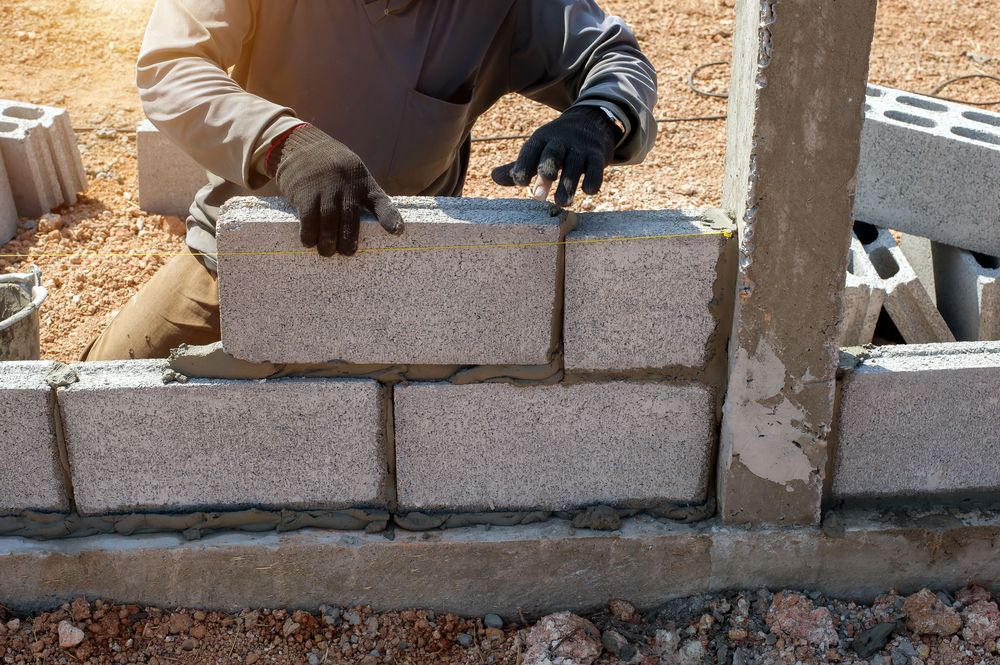 Our Brick & Block Construction service ensures durable, aesthetically pleasing structures, perfect for any home. We specialize in concrete slab construction to provide a solid foundation and enhance your property's value and stability. for Sloan's Concrete in Hilliard, FL