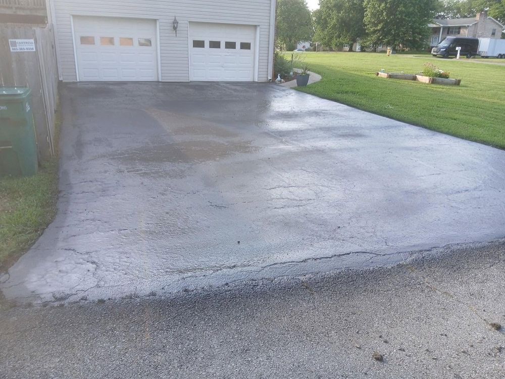 Protect and beautify your driveway with our expert sealcoating service. Shield against weather damage, prevent cracks, and enhance curb appeal for a durable and attractive asphalt surface. for Asphalt Animals in Little Rock, AR