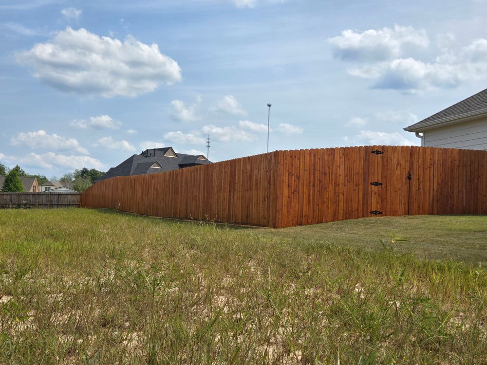 Fence staining for Patriot Fence  in Oakland, TN