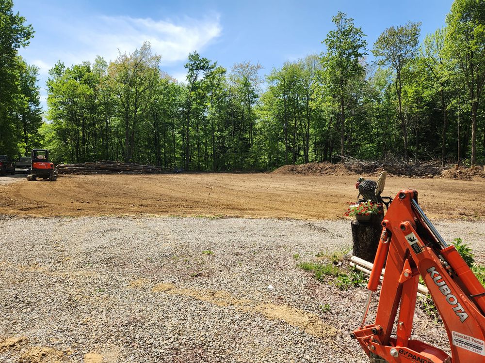 Our Land Grading service ensures your property's foundation is level, preventing water pooling and structural issues. Trust us to create a smooth and stable surface for your outdoor projects. for Simz Excavating & Plowing LLC in Warren, PA