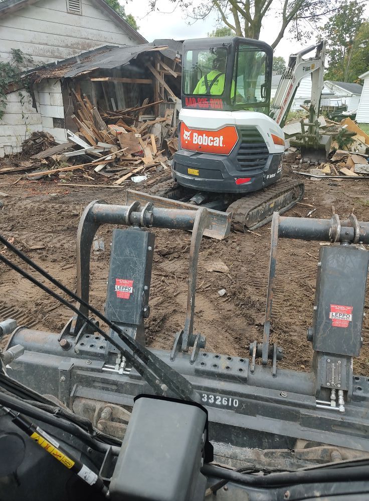 Our comprehensive demolition services ensure safe, efficient removal of old concrete structures, paving the way for new projects. Trust our skilled team to handle every detail with precision and care for your property. for Henceroth Construction in Amherst, OH