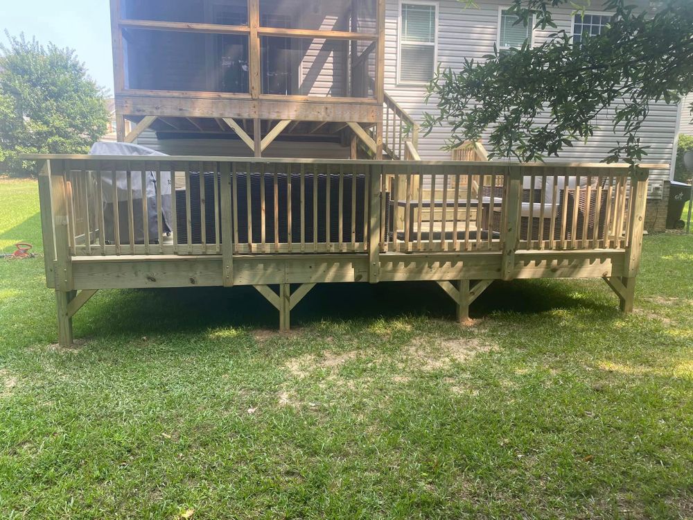 Our Deck Construction service offers homeowners expert craftsmanship and quality materials to create stunning outdoor spaces that enhance the aesthetics and functionality of their homes. for Dillard Construction & Remodeling, LLC in Wendell, NC