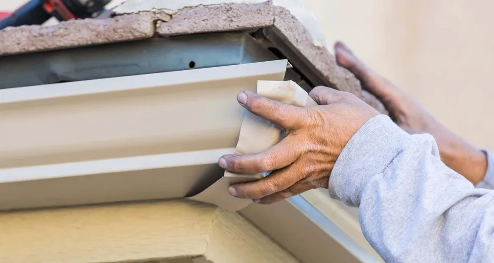 Our expert Gutter Install & Repair service ensures your home's gutters efficiently divert water, protecting your foundation and landscape while enhancing curb appeal with durable materials and professional craftsmanship. for Rhino Roofing & Masonry in Boston, MA