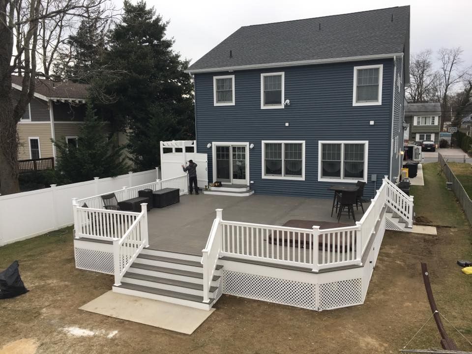 Our expert deck & patio installation service enhances outdoor living spaces, combining quality craftsmanship and personalized design to create beautiful, functional areas perfect for relaxing and entertaining at home. for Pinnacle Custom Home in Howell, NJ