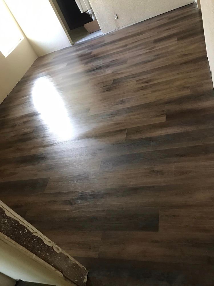 Revamp your home with our durable and stylish laminate flooring service. Choose from various designs to elevate the look of your space with high-quality, easy-to-maintain options for lasting beauty. for A1 Flooring & Remodeling in San Antonio, TX