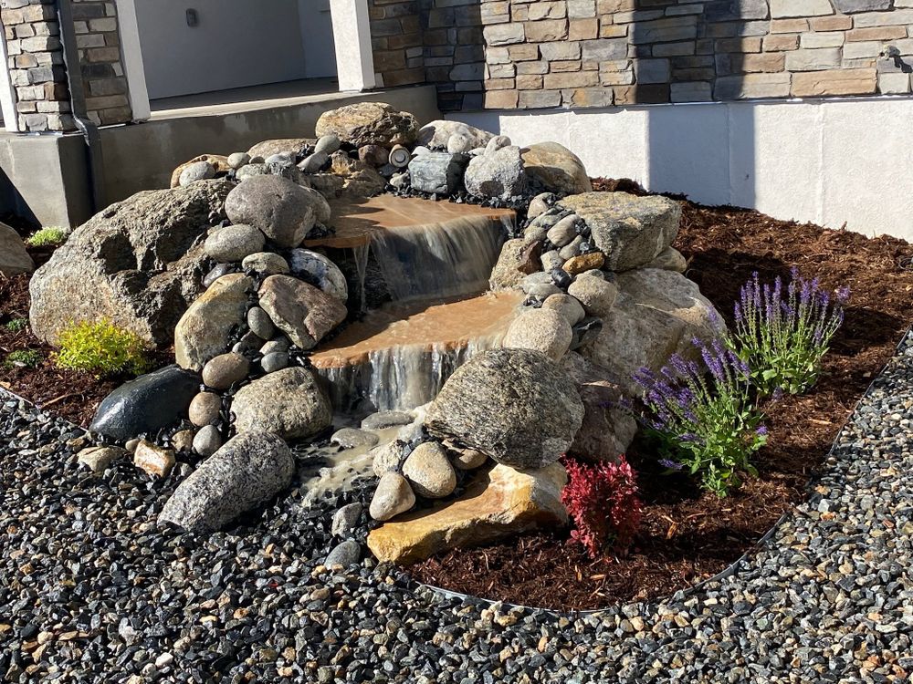 Enhance your outdoor living space with our expert Water Features service, creating tranquil and stunning fountains and ponds tailored to blend seamlessly with your landscape, adding beauty and soothing ambiance. for Pikes Peak Landscaping in Colorado Springs, CO