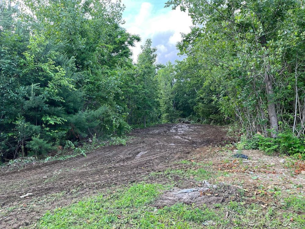 Our Ground Preparation service ensures your site is expertly leveled and cleared, providing a solid foundation for any construction project while enhancing drainage and preventing future structural issues. for Ox County INC in Oxford, MA