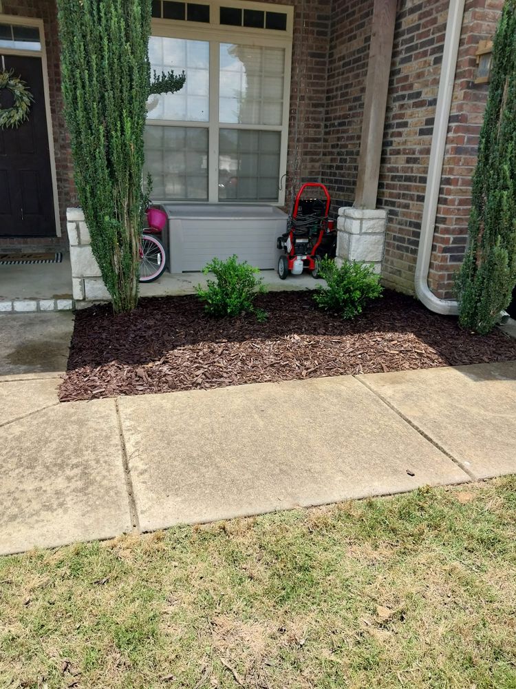 Enhance your garden's appearance and health with our professional mulch installation service, providing optimal moisture retention, weed suppression, and soil protection to ensure your landscape thrives all year round. for Mendoza landscaping and lawn care in England, AR